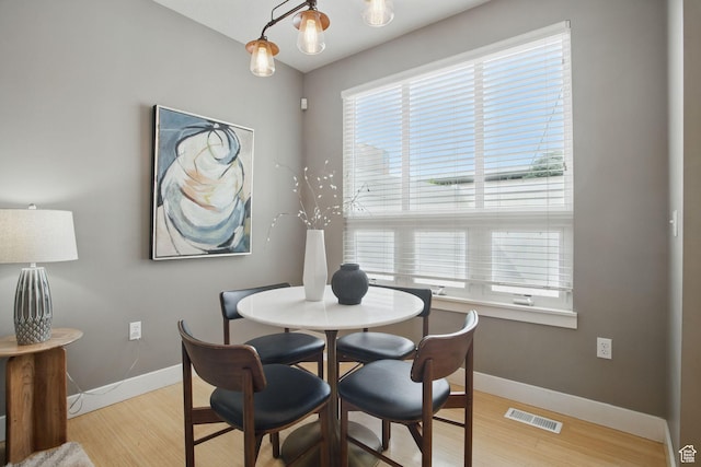 333 E Stanton Ave S, Salt Lake City, UT 84111 - dining room with baseboards, plenty of natural light, and light wood-style flooring