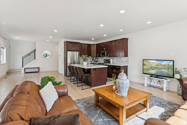 105 S 600 E, Provo, UT 84606 - living area featuring recessed lighting, light wood-style floors, and stairs