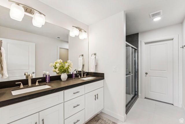 105 S 600 E, Provo, UT 84606 - bathroom with double vanity, a shower stall, baseboards, and tile patterned flooring