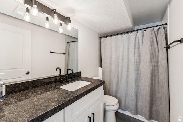 105 S 600 E, Provo, UT 84606 - full bath featuring toilet, vanity, a textured ceiling, and tile patterned flooring
