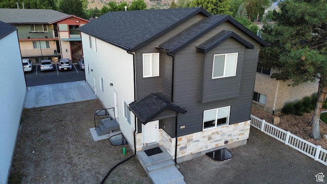 105 S 600 E, Provo, UT 84606 - view of front of home with stone siding and roof with shingles