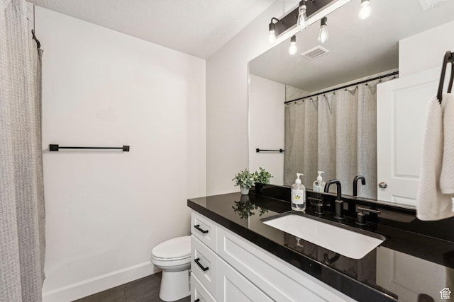 105 S 600 E, Provo, UT 84606 - full bathroom featuring toilet, vanity, baseboards, and a shower with curtain