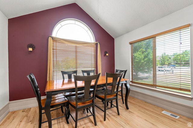 14008 S Emmeline Dr, Herriman, UT 84096 - dining space featuring lofted ceiling, light wood-style flooring, and baseboards