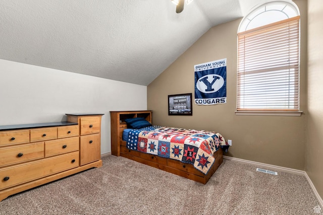 14008 S Emmeline Dr, Herriman, UT 84096 - bedroom with vaulted ceiling, carpet flooring, baseboards, a textured ceiling, and ceiling fan