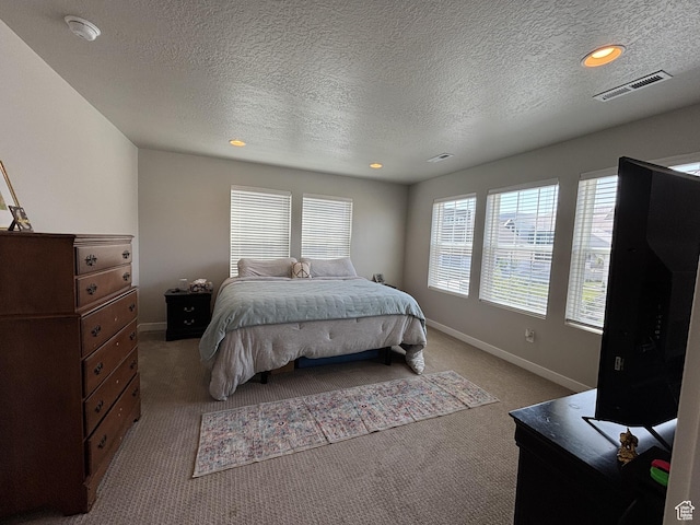 11603 S Outfitter Way S, Jordan, UT 84009 - carpeted bedroom with baseboards, a textured ceiling, and recessed lighting