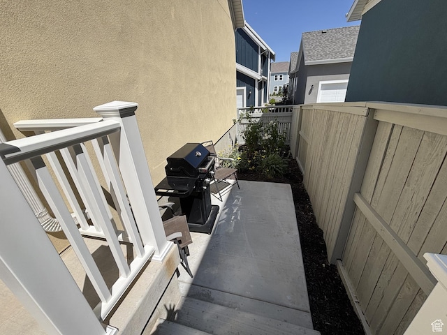 11603 S Outfitter Way S, Jordan, UT 84009 - view of patio / terrace featuring a grill and a residential view