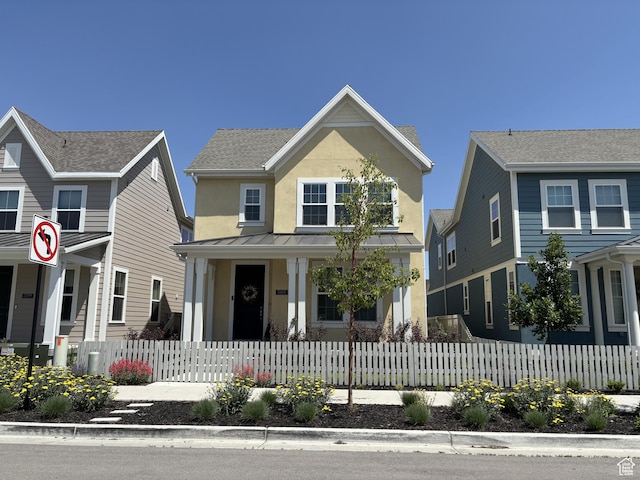11603 S Outfitter Way S, Jordan, UT 84009 - traditional home featuring a porch, stucco siding, a standing seam roof, and metal roof