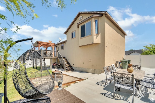 583 N 640 W, Tooele, UT 84074 - view of patio with stairway, a deck, a pergola, and outdoor dining area