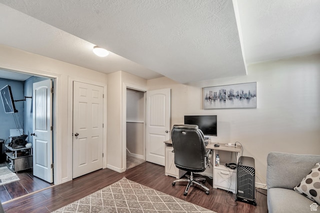 583 N 640 W, Tooele, UT 84074 - office area with dark wood-style flooring, a textured ceiling, and baseboards