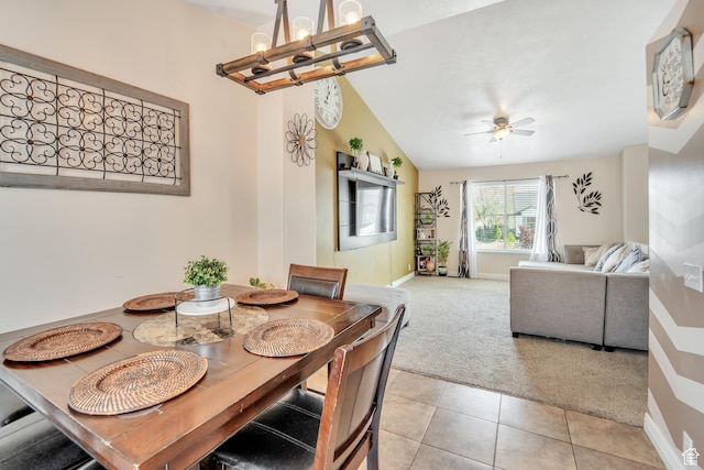 583 N 640 W, Tooele, UT 84074 - dining space with light carpet, a chandelier, baseboards, ceiling fan, and light tile patterned flooring