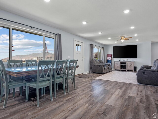 745 W Mckellar, Tooele, UT 84074 - dining room with wood finished floors, recessed lighting, ceiling fan, a mountain view, and baseboards
