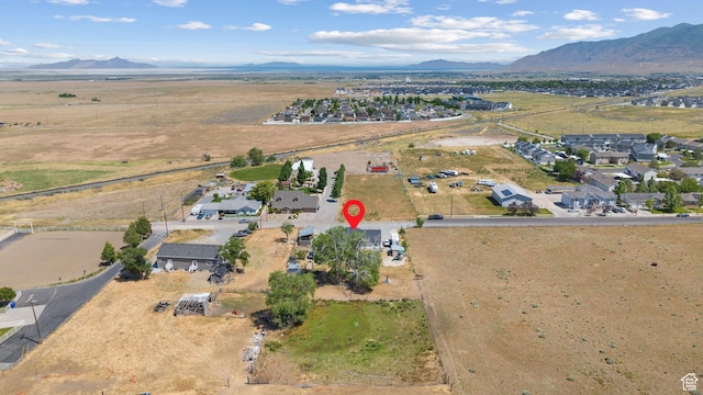 745 W Mckellar, Tooele, UT 84074 - aerial view of property and surrounding area featuring a mountainous background and rural landscape