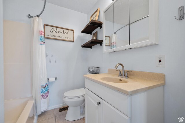 745 W Mckellar, Tooele, UT 84074 - full bathroom with vanity, toilet, tile patterned floors, and shower / tub combo