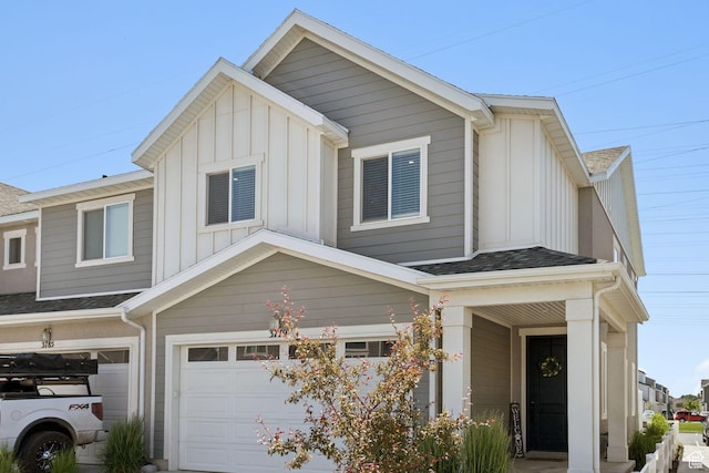 3779 S 3250 W, West Haven, UT 84401 - view of property with board and batten siding and a garage