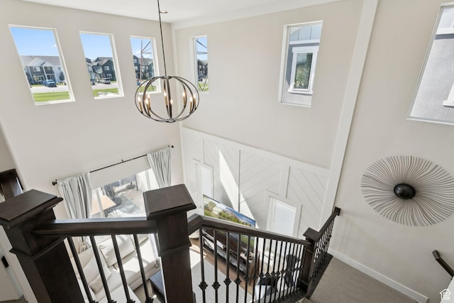3779 S 3250 W, West Haven, UT 84401 - stairway with a chandelier, carpet flooring, and baseboards