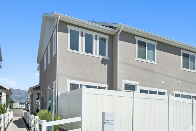 3779 S 3250 W, West Haven, UT 84401 - view of home's exterior with stucco siding and a mountain view