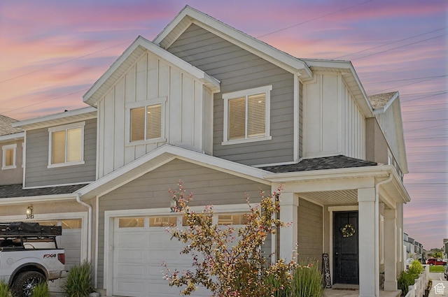 3779 S 3250 W, West Haven, UT 84401 - view of property featuring board and batten siding and a garage