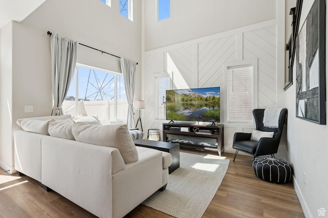 3779 S 3250 W, West Haven, UT 84401 - living room featuring wood finished floors and a towering ceiling
