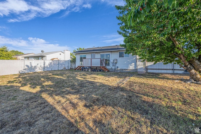 5494 W Townsend Way, West Valley City, UT 84118 - back of house featuring a wooden deck