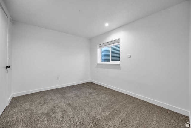 5494 W Townsend Way, West Valley City, UT 84118 - spare room with dark carpet, recessed lighting, and baseboards