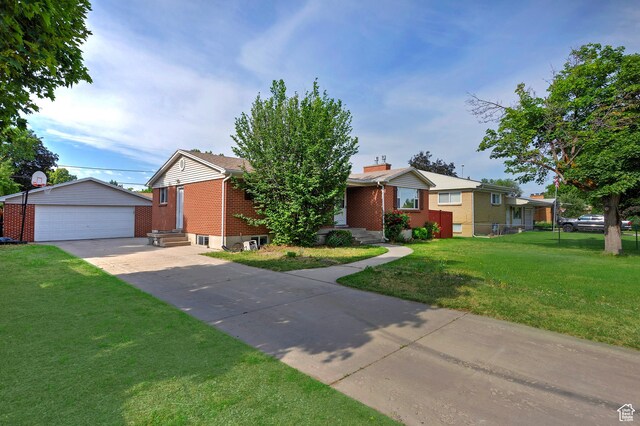 628 E Wyandotte Ave S, Sandy, UT 84070 - ranch-style home featuring an outbuilding, brick siding, a garage, and a front lawn