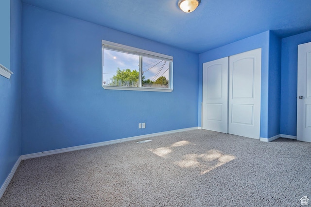628 E Wyandotte Ave S, Sandy, UT 84070 - unfurnished bedroom with carpet flooring, baseboards, and a closet