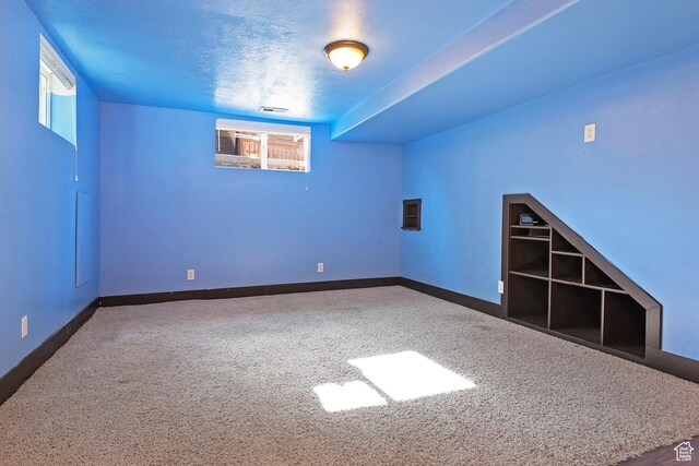 628 E Wyandotte Ave S, Sandy, UT 84070 - carpeted spare room with baseboards