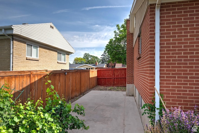 628 E Wyandotte Ave S, Sandy, UT 84070 - fenced backyard featuring a patio area