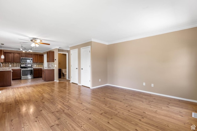 410 Wheatridge Rd, Stansbury Park, UT 84074 - unfurnished living room featuring a ceiling fan, ornamental molding, light wood-style floors, and baseboards