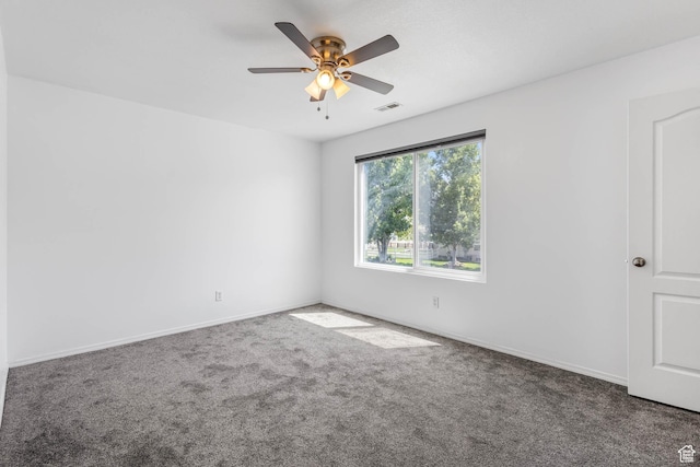 410 Wheatridge Rd, Stansbury Park, UT 84074 - carpeted empty room with a ceiling fan and baseboards