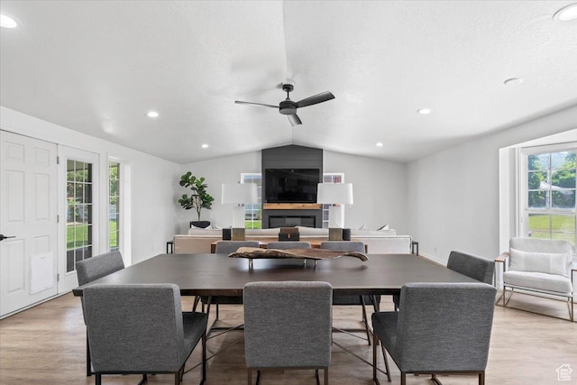 1392 N 450 E, Bountiful, UT 84010 - dining space featuring lofted ceiling, ceiling fan, light wood-style floors, a large fireplace, and recessed lighting