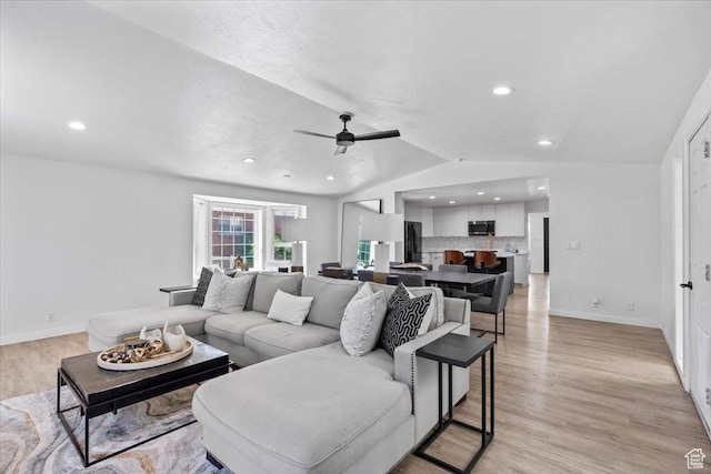1392 N 450 E, Bountiful, UT 84010 - living room featuring a ceiling fan, lofted ceiling, light wood-style floors, baseboards, and recessed lighting