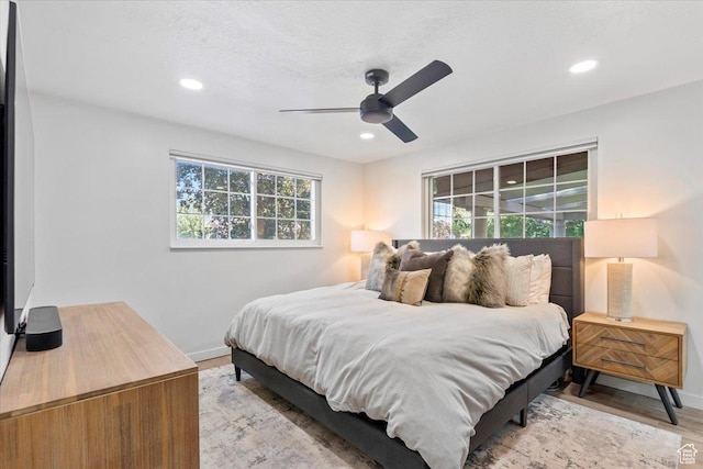 1392 N 450 E, Bountiful, UT 84010 - bedroom featuring multiple windows, baseboards, wood finished floors, recessed lighting, and a ceiling fan