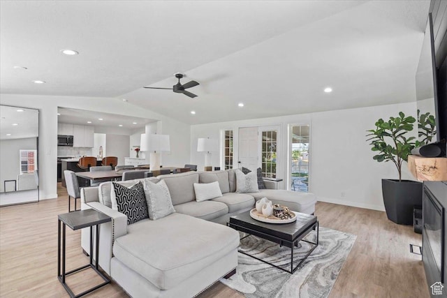 1392 N 450 E, Bountiful, UT 84010 - living room featuring light wood-type flooring, a ceiling fan, lofted ceiling, recessed lighting, and baseboards