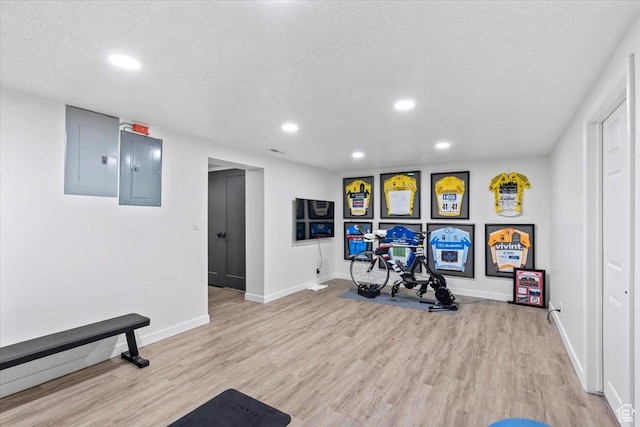 1392 N 450 E, Bountiful, UT 84010 - exercise room featuring electric panel, recessed lighting, wood finished floors, a textured ceiling, and baseboards