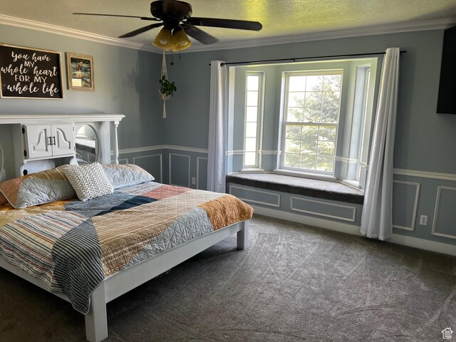 9029 N Treasureton Rd, Preston, ID 83263 - carpeted bedroom featuring ornamental molding, wainscoting, and ceiling fan