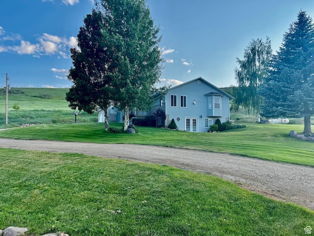 9029 N Treasureton Rd, Preston, ID 83263 - view of home's exterior featuring a lawn