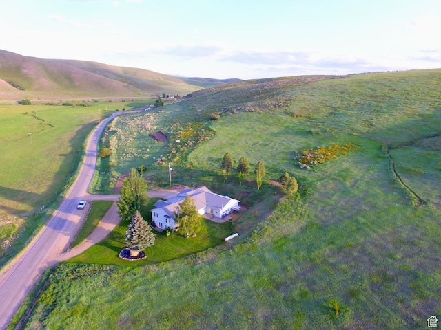 9029 N Treasureton Rd, Preston, ID 83263 - aerial overview of property's location with a mountainous background and rural landscape