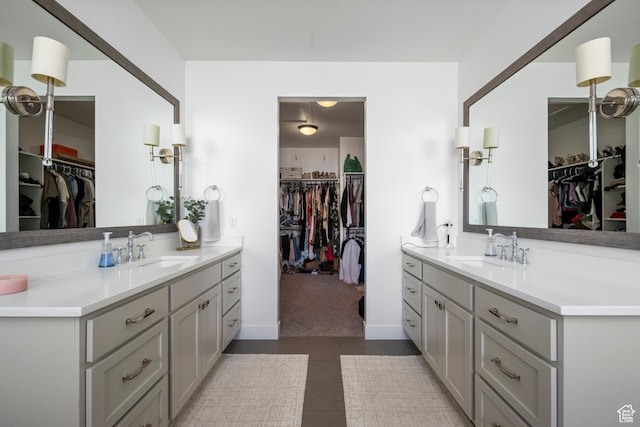 12184 N Bridgegate Way, Highland, UT 84003 - bathroom featuring two vanities and a walk in closet