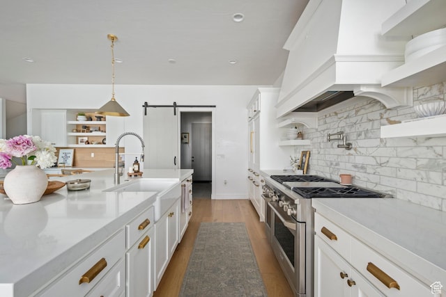 12184 N Bridgegate Way, Highland, UT 84003 - kitchen with high end stainless steel range oven, open shelves, white cabinetry, a sink, and recessed lighting