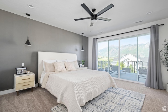 12184 N Bridgegate Way, Highland, UT 84003 - bedroom with carpet flooring, access to exterior, ceiling fan, baseboards, and a mountain view