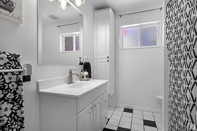 3243 S 200 W, Bountiful, UT 84010 - full bath with vanity, toilet, and tile patterned flooring