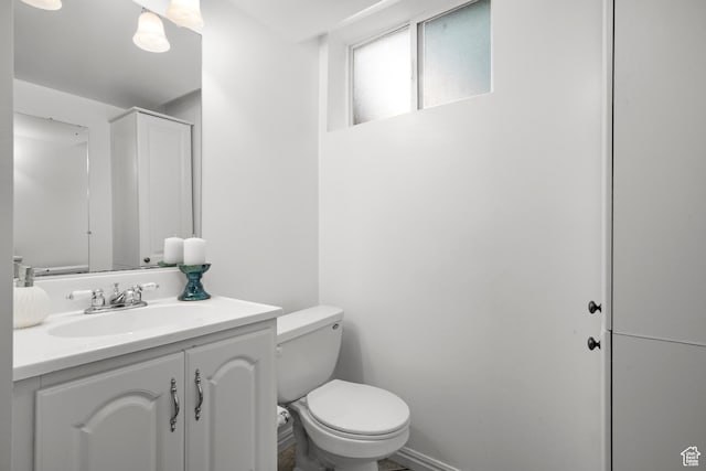 3243 S 200 W, Bountiful, UT 84010 - half bathroom with toilet, vanity, and baseboards