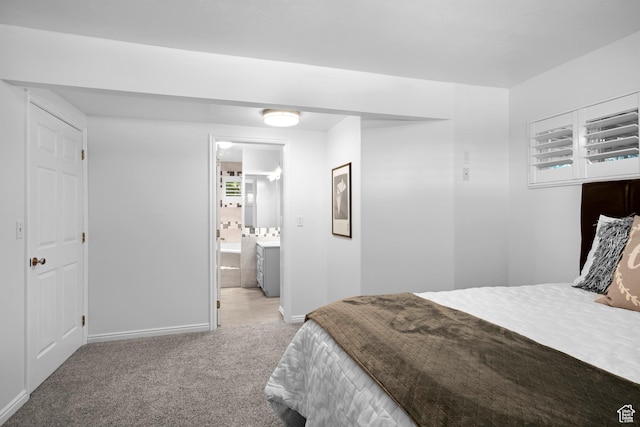 3243 S 200 W, Bountiful, UT 84010 - bedroom with baseboards, light colored carpet, and connected bathroom