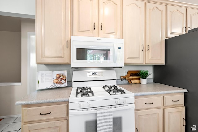 3243 S 200 W, Bountiful, UT 84010 - kitchen with white appliances, light countertops, light brown cabinets, and light tile patterned floors