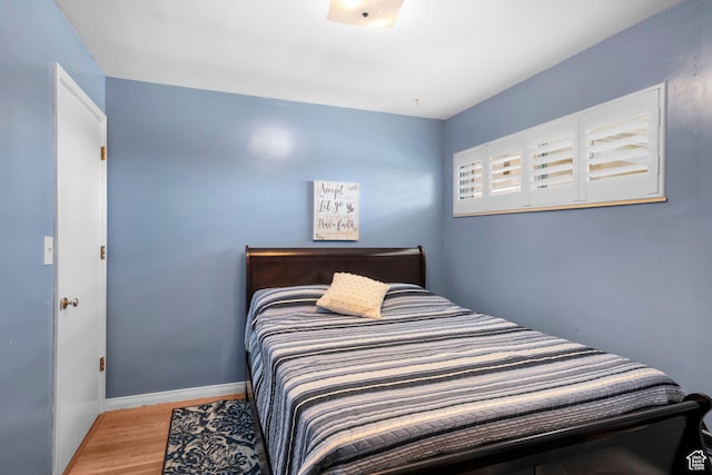 3243 S 200 W, Bountiful, UT 84010 - bedroom featuring wood finished floors and baseboards