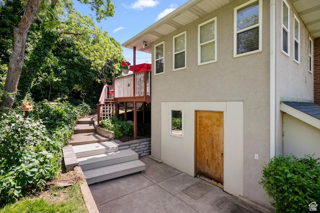 3243 S 200 W, Bountiful, UT 84010 - rear view of property with stairway, stucco siding, a deck, and a patio