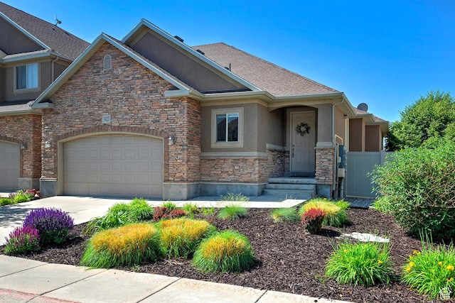 3423 W Mount Cortina Way, Riverton, UT 84065 - craftsman-style house with stone siding, stucco siding, concrete driveway, and a garage