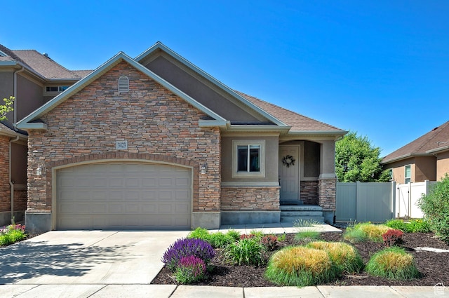 3423 W Mount Cortina Way, Riverton, UT 84065 - craftsman inspired home with stone siding, stucco siding, concrete driveway, and a garage