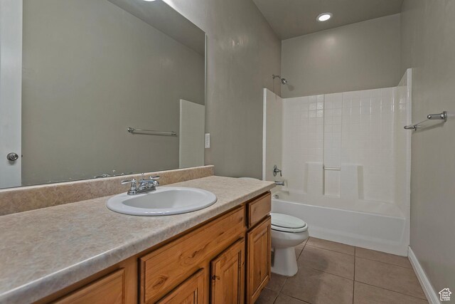 3423 W Mount Cortina Way, Riverton, UT 84065 - bathroom featuring tile patterned flooring, vanity, toilet,  shower combination, and baseboards